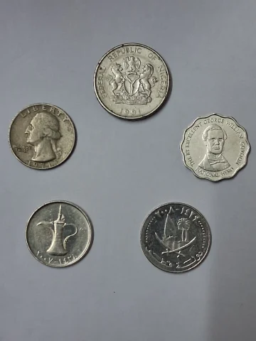 Old coins of Jamica, USA, Qatar, UAE, Nigeria