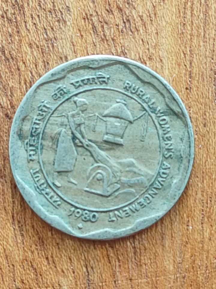 1980 25 paise with mint mark rural women advancement