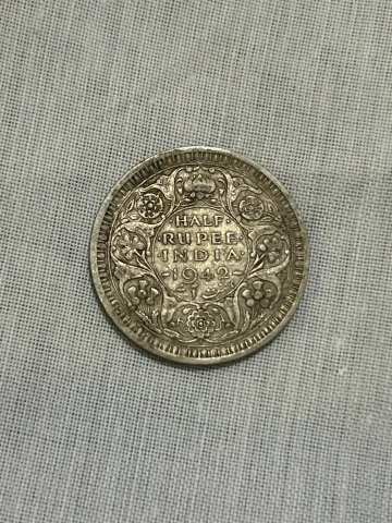 British India 1942 Half Rupee (8 Annas), King George VI, and it is a silver coin. The standard 1942 Bombay… — photo 2 of 2