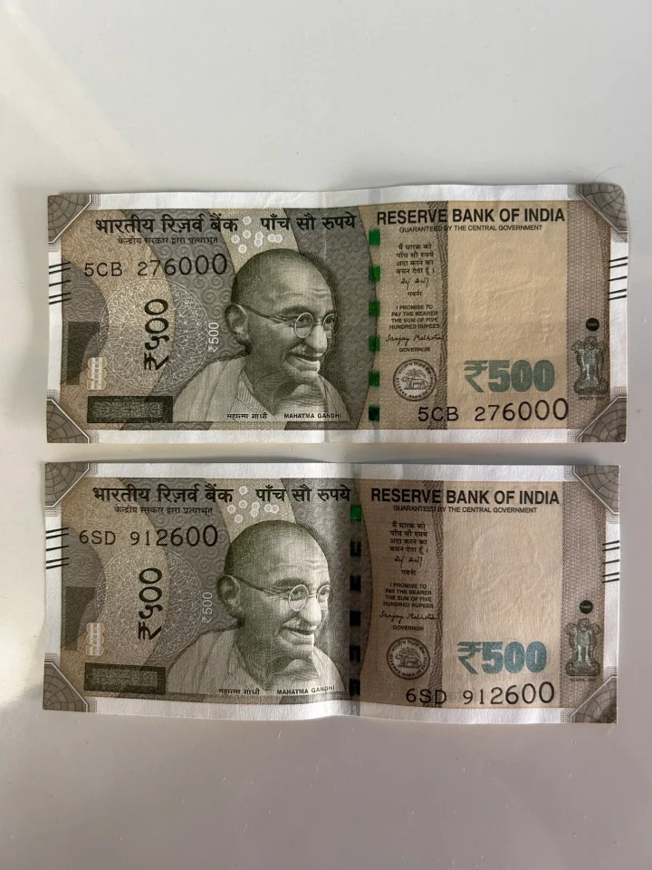 Two 500 Rupees notes with special numbers