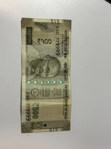 I have got a 500 ₹ note with serial number 2AU 779999