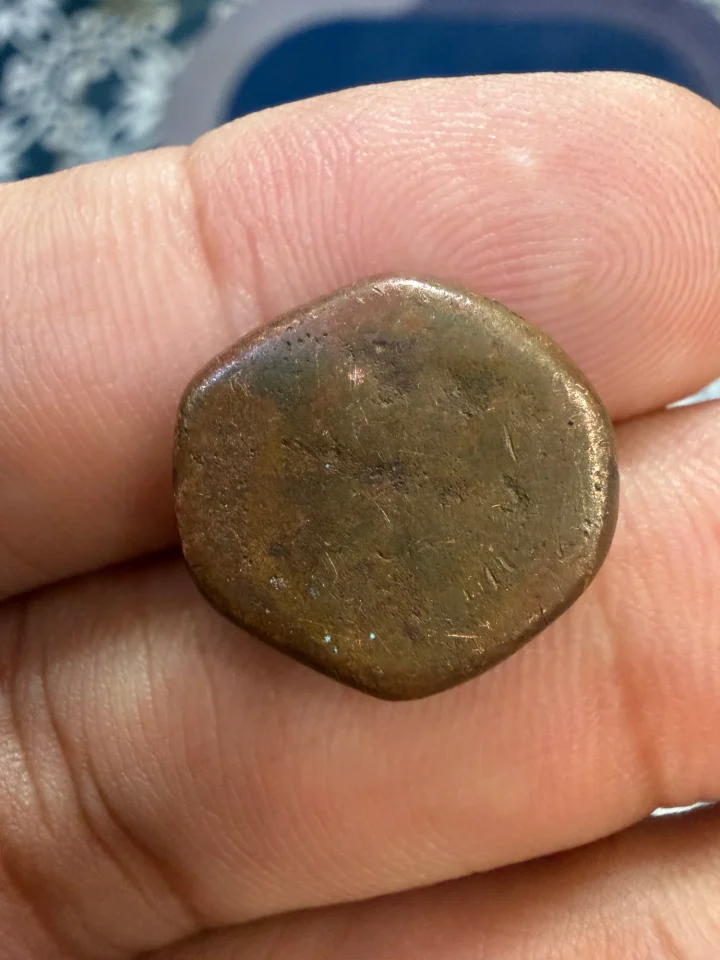 early historical, hand-struck copper coin