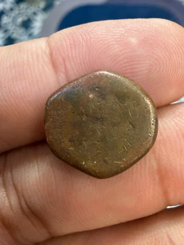early historical, hand-struck copper coin