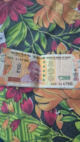 Note of 200/- Rs serial number is 614786