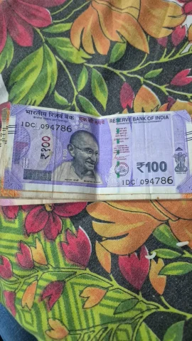 100 Rs Note serial number is ending 786