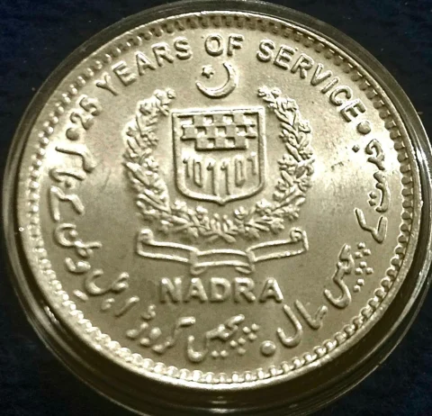 .     🇵🇰 PAKISTAN 🇵🇰    25 Rupees 2025  👇🏻A very rare non circulating coin in Brilliant uncirculated Mirror finish grade limited stock  ##Commemorative issue 25th Anniversary of NADRA  ##Obverse Star and crescent (Pakistan national emblem) divide face value. Below, date with two wheat sheafs beneath.  ##Reverse NADRA Logo at center, text on top in English "25 Years of Service", text in Urdu on right which translates to "25 Years of Service" and on left which translates to "in the name of 250 million people".