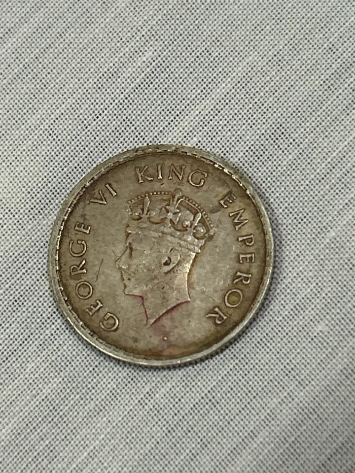 This is a 1939 British India ½ Rupee (8 Annas) featuring King George VI. It is a silver coin (91.7% silver)… — photo 1 of 2